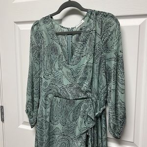 Calvin Klein’s faux wrap dress and asymmetrical